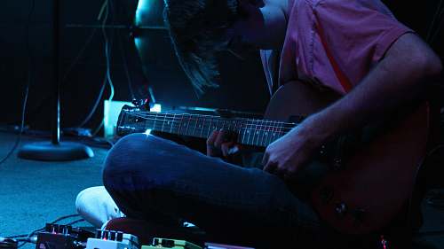 musical instrument person playing guitar guitar